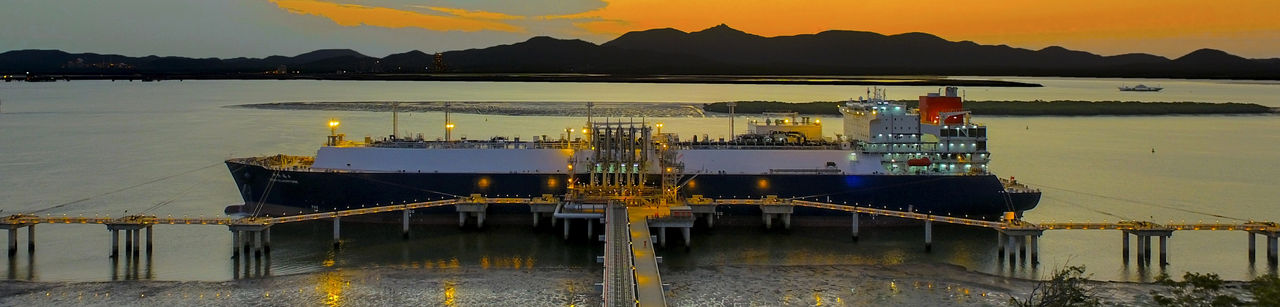 LNG ship moored at sunset